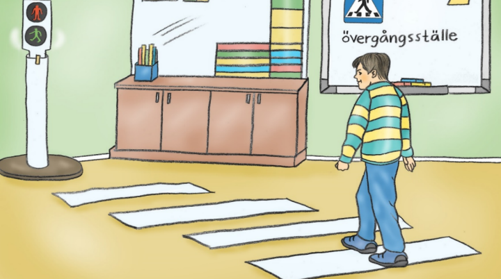 Illustration av ett rum där en pojke går på ett övergångsställe. Framför övergångsstället ser vi ett rödljus, en bänk och en tavla där det står "övergångsställe".
