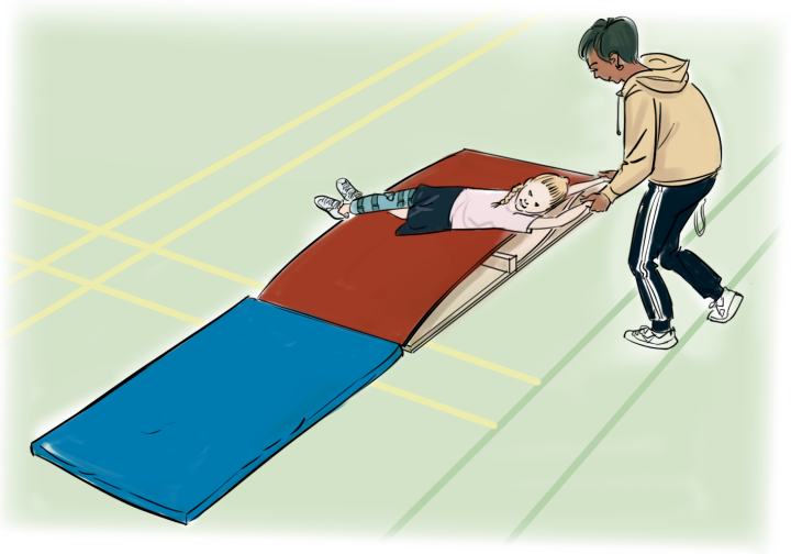 två elver varav en ligger på mjuka mattor.