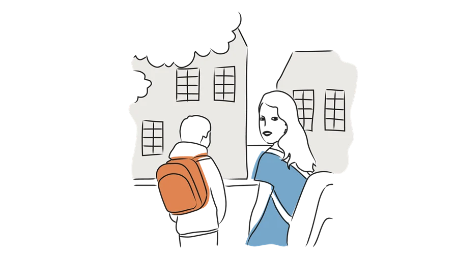 Två elever går mot skolan