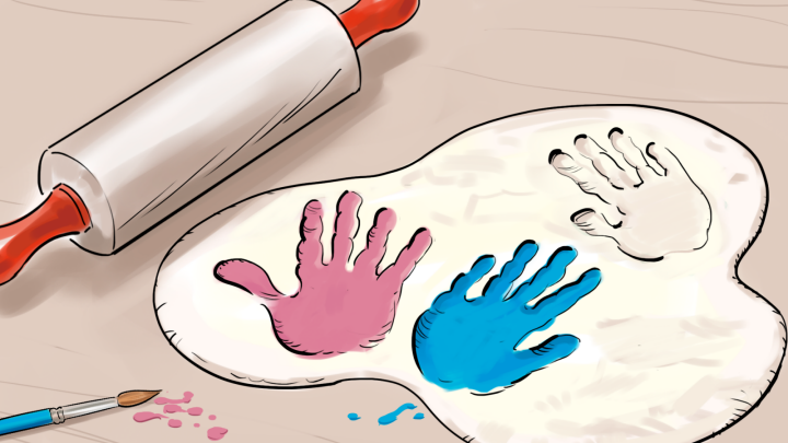 Handavtryck i en utkavlad deg.