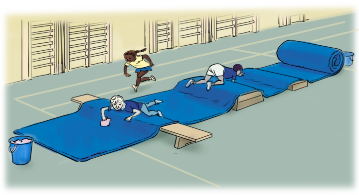 Barn i en idottsal som kryper över bockar och plintar.